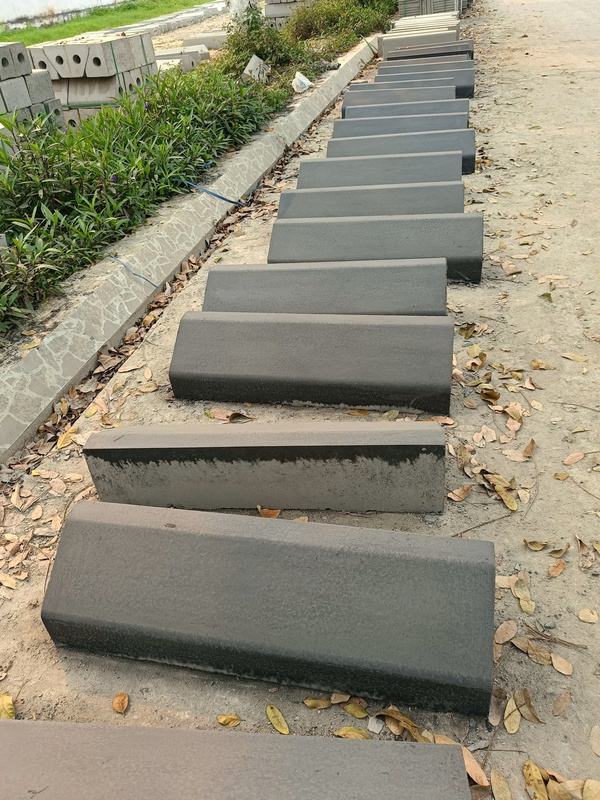 Bó vỉa bê tông giả đá 23x26x100cm màu đen - Gạch Bắc Việt - Công Ty Cổ Phần Tư Vấn Và Xây Dựng Hạ Tầng Kỹ Thuật Bắc Việt